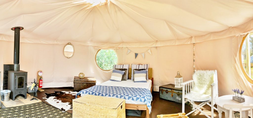 The park's glamping tents (above) are perfect just for two… as long as both guests are old enough to vote
