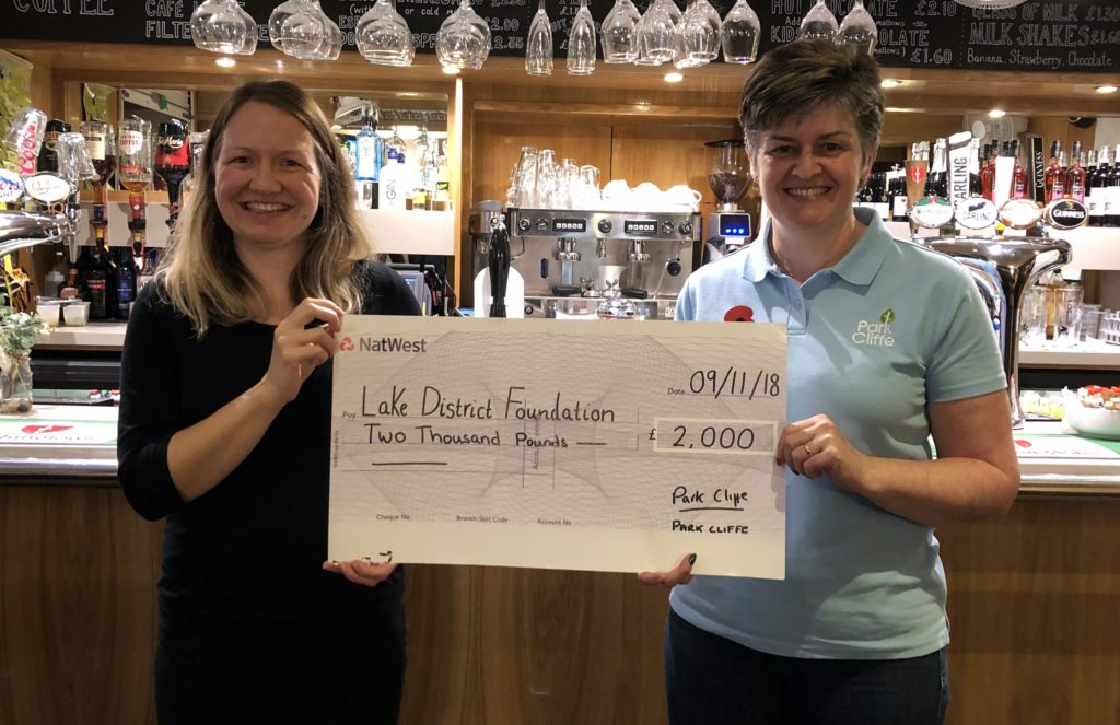 Fix the Fells operations manager Sarah Smith (left) receives the donation from Park Cliffe's Susan Dickson